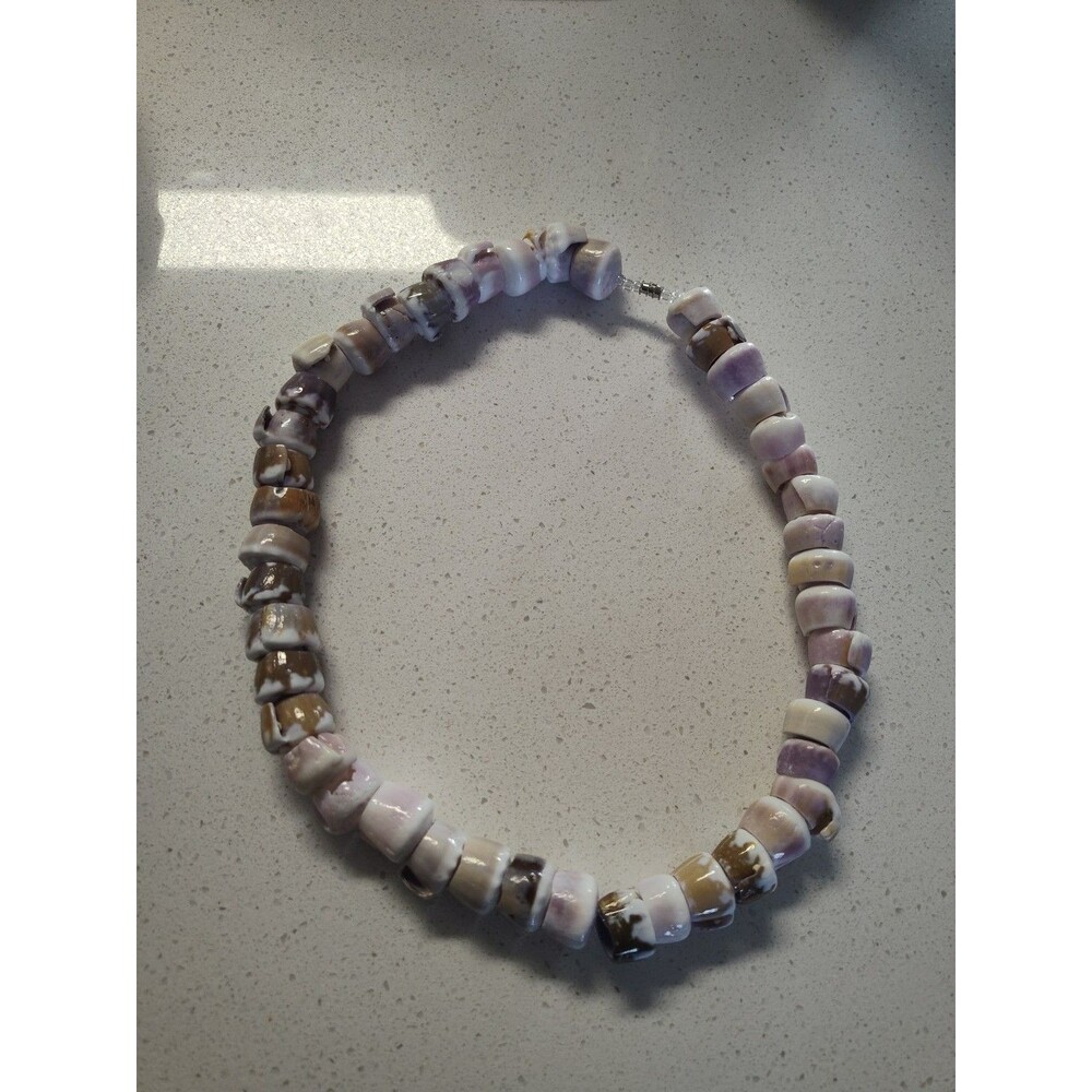Spiral Puka Shell Necklace 23 inch length with 3/4" wide multi-color shells